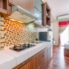 Отель Cozy Living Studio At Pakubuwono Terrace Apartment, фото 2