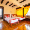 Отель OYO 2640 Rumah Kayu Cottage Syariah, фото 21