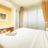 Отель Elegant And Comfy 1Br At Dago Suites Apartment, фото 4