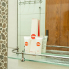 Отель OYO 936 Tremigo Guest House Syariah, фото 7
