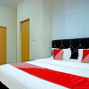 Отель OYO 90979 Ryfana Residence Syariah, фото 27