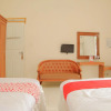 Отель Loji Rejo Guest House By OYO Rooms, фото 7