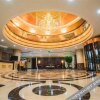 Отель Xin Pu Jing Business Hotel (Linyi Taisheng Plaza), фото 2