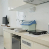 Отель Warm And Cozy Studio Room At Sky House Bsd Apartment, фото 8