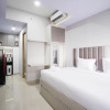 Отель Nice And Comfy Studio At Grand Dharmahusada Lagoon Apartment, фото 5