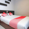 Отель OYO 717 Hotel Dharma Utama Syariah, фото 3