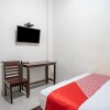 Отель OYO 93477 Almahyra Guest House Syariah, фото 12