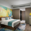 Отель Ramada Encore by Wyndham Guangzhou South, фото 3