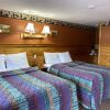 Отель Alpine Country Inn and Suites, фото 6