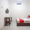 Отель OYO 93477 Almahyra Guest House Syariah, фото 10