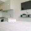 Отель Comfortable Studio With Pool View At Sky House Bsd Apartment, фото 5