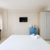 Отель Cozy Studio with City View at Elvis Tower Apartment, фото 14