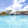 Отель Charming Tropical Villa, Walk to the Beach! AC, Pool, Free Wifi, Concierge, Ideal for Families, фото 1