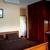 Отель Brahminy Kite Holiday Home в Кота-Кинабалу