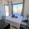 Отель Apartment with 360° balcony and Direct Sea and Harbour View!, фото 5