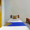 Отель SPOT ON 91064 Wisma Lec Syariah, фото 12