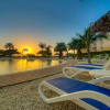 Отель Ocean Front 2BR 2BA w Amazing Beach, фото 22