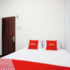Отель OYO 94176 Suka Maju Homestay Syariah, фото 6