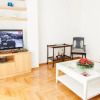 Отель Cozy apt with Lycabettus View, фото 1