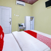 Отель OYO 92206 Maharani Guest House Syariah, фото 3