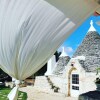 Отель Antico trullo ristrutturato con piscina e giardino, фото 22