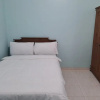 Отель OYO 93695 Guest House Riharti Syariah, фото 4