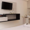 Отель Cozy Living Studio At Urbantown Apartment Karawang, фото 4