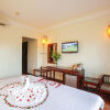 Отель Golden Star Villa Hoi An в Хойан