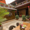Отель Lijiang Mengli Qianxun Inn, фото 12