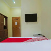 Отель OYO 335 Wisma Empat Lima Syariah, фото 5