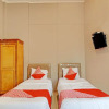 Отель OYO 92924 Kalista Guest House Syariah, фото 7