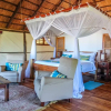Отель Saadani Safari Lodge - bush, river, beach, фото 34