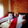 Отель Klein Windhoek Self-Catering Apartments, фото 29