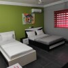 Отель Royal Blue Guest House Bar Deluxe Twin Bed в Ломе