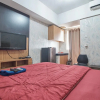 Отель Apartment Green Lake View Ciputat by Celebrity Room, фото 19
