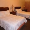 Отель Turks and Caicos Airport Hotel, фото 1