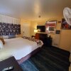 Отель Bluebird Day Inn & Suites, фото 19