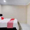 Отель OYO 93087 Wisma Apel Syariah, фото 14