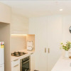 Отель Unmatched Waterfront Apartment, фото 4