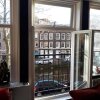 Отель Jordaan Canal View Apartment в Амстердаме