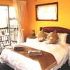Отель Flintstones Guest House Durban, фото 8
