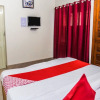 Отель OYO 14606 Holiday Inn, фото 2
