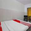 Отель OYO 92533 Harjuna Guest House, фото 5