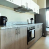 Отель Tawila - Lovely 2-bedroom unit with shared pool, фото 3