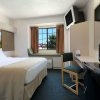 Отель Microtel Inn by Wyndham Arlington/Dallas Area в Арлингтоне