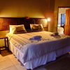 Отель Umkhumbi Lodge, фото 1