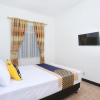 Отель OYO 2268 Tim-tim Homestay Syariah, фото 5