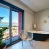 Отель Reddoors Suites Sea View, фото 11
