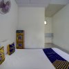 Отель SPOT ON 92855 Griya Sandi Syariah Rogojampi, фото 12