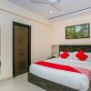 Отель Pride Suites By OYO Rooms, фото 4